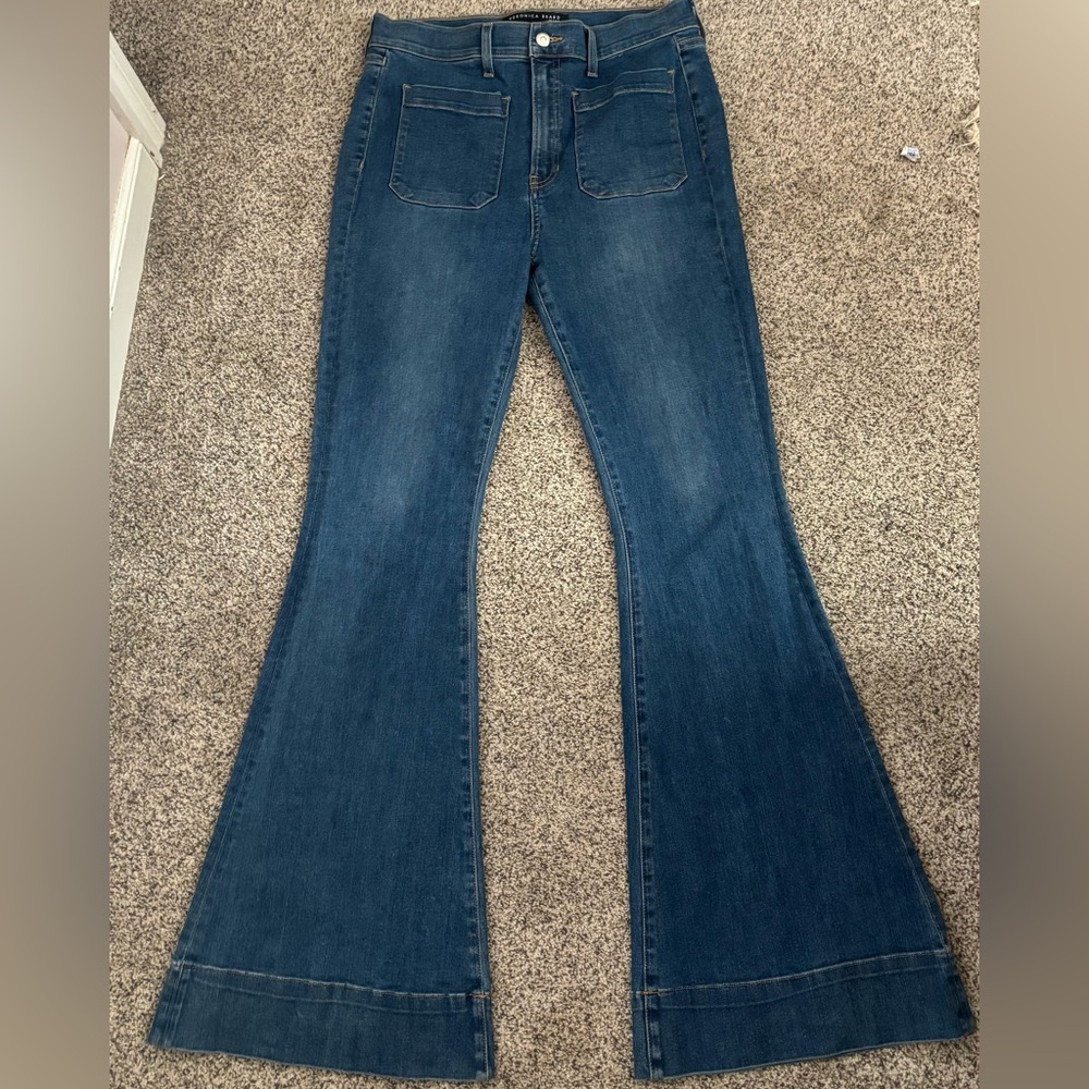 Veronica Beard medium wash, high rise bell bottom with great fit